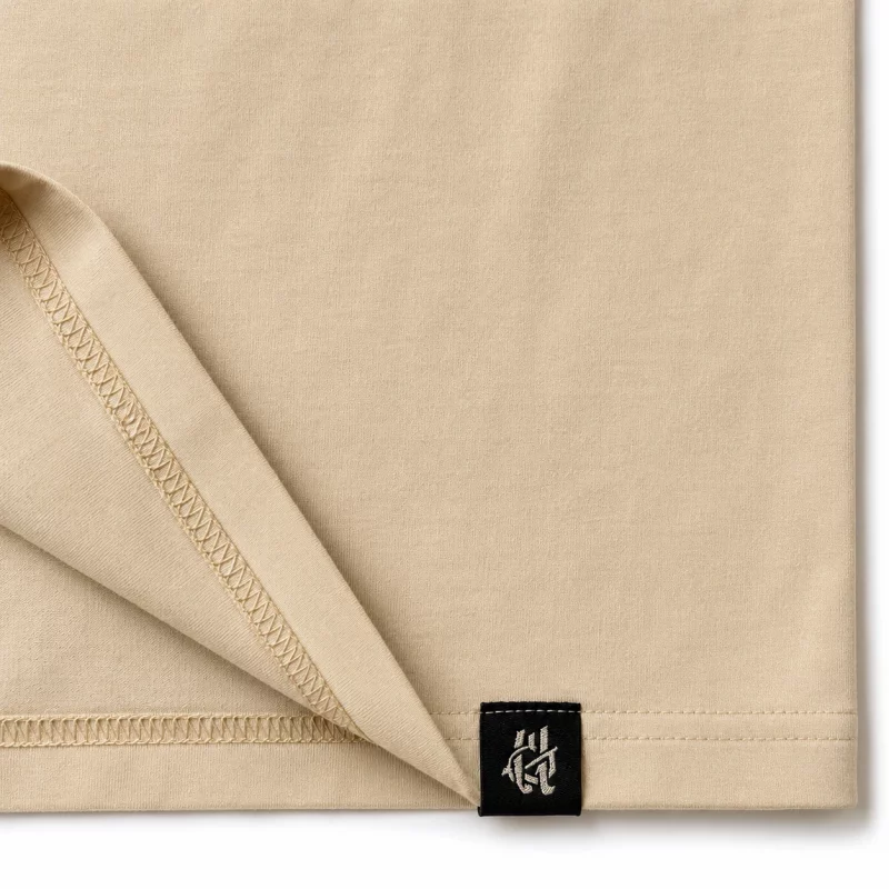 urbngrn-munchies-beige-shirt-hem-label-detail
